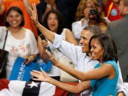 El Presidente Obama y su esposa, Michelle, durante su campaña en Virginia. AP  /
