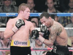 Saúl Álvarez retuvo su corona Superwelter del Consejo Mundial de Boxeo, al derrotar por decisión unánime a Mosley. AFP  /