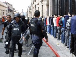 Los integrantes de la CUL exigen la liberación de los 10 estudiantes acusados de la quema de vehículos. ARCHIVO  /