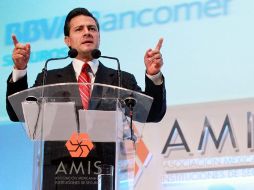 Enrique Peña Nieto, durante su participación en la XXII Convención de Aseguradores de México. NOTIMEX  /