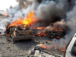 Doble atentado perpetrado en la zona de Qazaz, a unos cinco kilómetros al sur de Damasco. EFE  /