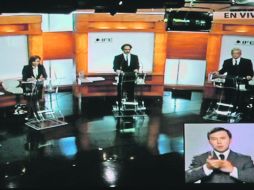 Los presidenciables, al inicio de su primer debate televisado.EL UNIVERSAL  /