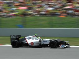 Sergio Pérez conduce su Sauber C31 por el trazado del Circuito de Montmeló. AFP  /