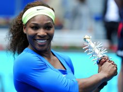 La ex número uno del mundo derrotó en la final del torneo madrileño a la actual mundial, Victoria Azarenka. AFP  /