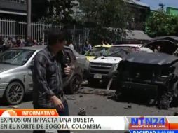 Imagenes de la zona de la explosión donde algunos autos quedaron incinerados. Imagen tomada del video de televisión. ESPECIAL  /