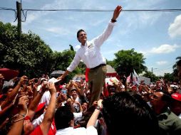 Enrique Peña Nieto, abanderado presidencial de la coalición Compromiso por México, durante su gira en Veracruz. EL UNIVERSAL  /