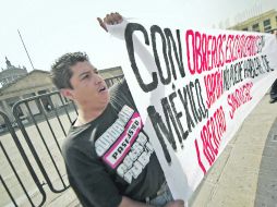 Trabajadores que dijeron pertenecer al Sindicato Único de Trabajadores de Honda de México exigieron el reconocimiento de su gremio.  /