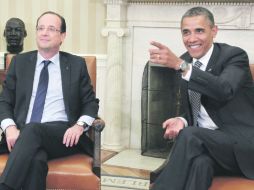 El nuevo mandatario francés, François Hollande, aparece ante los medios junto a su homólogo estadounidense, Barack Obama. AP  /