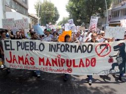 Durante el recorrido por calles de Guadalajara, personas se fueron sumando a la marcha..  /