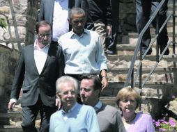 Fue notorio el acercamiento entre François Hollande y Barack Obama en la cita de Camp David. AP  /
