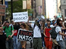 Desde la mañana, veteranos de guerra y miembros del movimiento ''Ocupa Wall Street'' comenzaron a concentrarse en el Grant Park. AFP  /