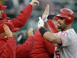 Pujols conectó batazo de cuatro esquinas para llevar a los Angelinos de Los Ángeles a la victoria. AP  /