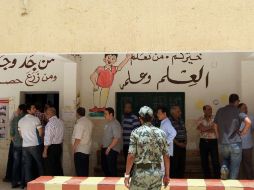 Los egipcios se dirigieron hoy en masa a las urnas para votar a su primer presidente tras la caída de Hosni Mubarak. AFP  /