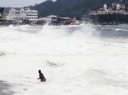 Autoridades locales afirman que, de haber llegado ''Bud''con toda su fuerza, el ciclón los hubiera terminado de dañar. EFE  /