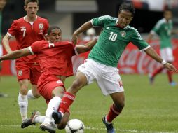 Dos Santos Ramírez jugó este domingo, con la Selección mexicana, frente a Gales. AP  /