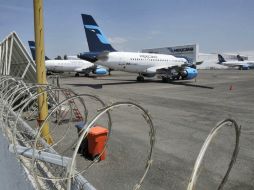 Ordenaron a las autoridades abstenerse de recuperar el hangar en el que opera la base de mantenimiento de Mexicana de Aviación. ARCHIVO  /