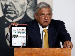 López Obrador presentó encuesta en la que tiene el 34% de las preferencias, 4% abajo de Peña Nieto, candidato del PRI.  /
