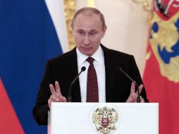 El presidente francés, Francois Hollande (D), y su homólogo ruso, Vladimir Putin . AP  /