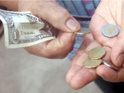 En casas de cambio de Mérida, el dólar se ofreció hasta en 14.49 pesos. ARCHIVO  /