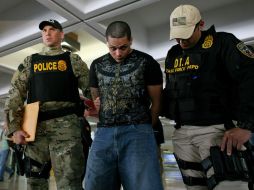 Agentes de la DEA y de la Policía de Puerto Rico detuvieron a personas vinculadas con envíos de droga. AP  /