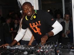 Usain Bolt sale ileso de un accidente en Jamaica. AFP  /