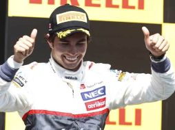 Sergio Pérez hace una gran carrera en Canadá y logra el tercer lugar. AP  /