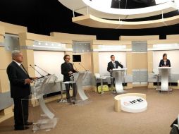 Los cuatro candidatos en el inicio del debate. NTX  /