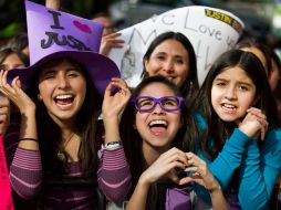 Detrás de cada ''Belieber'' puede haber un abnegado padre. AFP  /