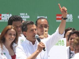 Durante el mitin en Tepeaca, Peña Nieto hizo un llamado para que impere la calma. NTX  /