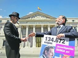 La línea de crédito para salvar a la banca ha generado protestas de los ciudadanos españoles. AP  /