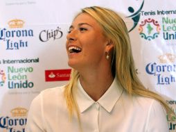 María Sharapova recibe la distinción para comandar la delegación rusa. MEXSPORT  /