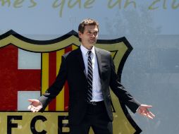 Con una imagen alejada de la proyectada en los últimos años, Vilanova se mostró vestido impecablemente con traje y corbata. REUTERS  /