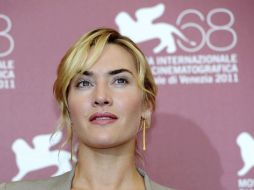 La actriz británica Kate Winslet recibió, a sus 36 años de edad, un título real por parte de la reina Isabel II. ARCHIVO  /