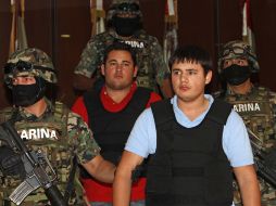Junto a Jesús Alfredo Guzmán (de rojo) fue detenido Kevin Daniel Beltrán Ríos, de 19 años de edad (de azul). AP  /