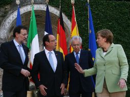 Los mandatarios de Mariano Rajoy, Mario Monti, François Hollande y Ángela Merkel durante la reunión en Roma. EFE  /