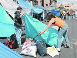 Docentes de la CNTE recogen sus tiendas de campaña en Morelia, los maestros se comprometieron a retornar a clases. NTX  /