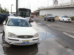 La basura que se encuentra tirada en la calle es la principal causa de las inundaciones. ARCHIVO  /