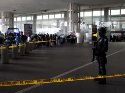 Una balacera en la terminal 2 del AICM dejó un saldo de tres policías muertos. AFP  /