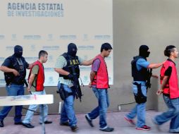 Elementos del Grupo Antisecuestros de la Policía Ministerial presentaron a cuatro presuntos responsables del secuestro. EL UNIVERSAL  /