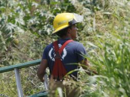 Para rescatar el cuerpo tuvieron que participar elementos de Protección Civil y Bomberos de Zapopan. ARCHIVO  /