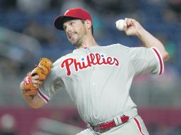 IMPOTENCIA. Cliff Lee, uno de los abridores estelares de los Filis, sumó su quinta derrota de la temporada. AFP  /