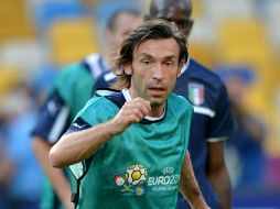 Andrea Pirlo supone que España sabe que tiene que restringir su tiempo de posesión de la pelota. AFP  /