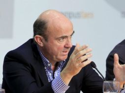 De Guindos recordó que cuando las cosas se han hecho ''de forma correcta'', se ha conseguido remontar. EFE  /