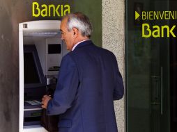 La justicia española aceptó el miércoles juzgar a más de una treintena de exejecutivos del banco nacionalizado Bankia. ARCHIVO  /