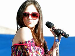 ''Adelante'' exalta el fervor olímpico de los amantes del deporte. En la imagen, Paty Cantú. ARCHIVO  /