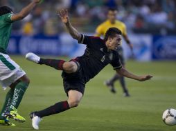 Herrera recibe una falta durante el partido, el cuadro de León complico el partido a la Olímpica. MEXSPORT  /