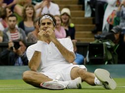 El suizo Roger Federer conquistó hoy su séptimo Wimbledon y se alzó como nuevo número uno del tenis mundial. AP  /