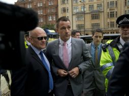 El capitán del Chelsea, John Terry, llega al primer día del juicio en un tribunal de Westminster. AP  /