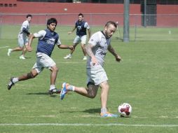 Matias Vuoso, atacante rojinergro, se reincorporó a la práctica esta mañana con el resto del plantel.  /