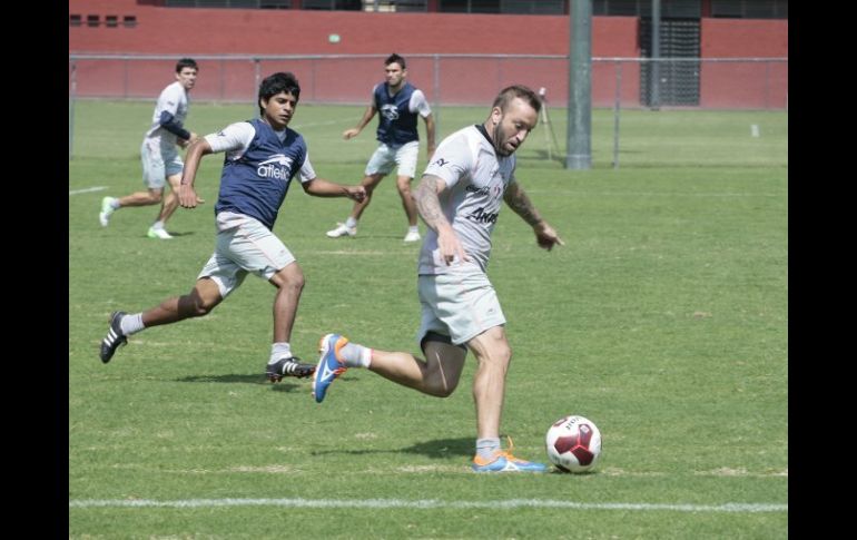 Matias Vuoso, atacante rojinergro, se reincorporó a la práctica esta mañana con el resto del plantel.  /